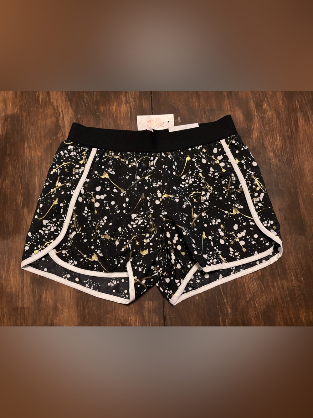 Justice Black Athletic Shorts with White Trim and Gold Splatter
